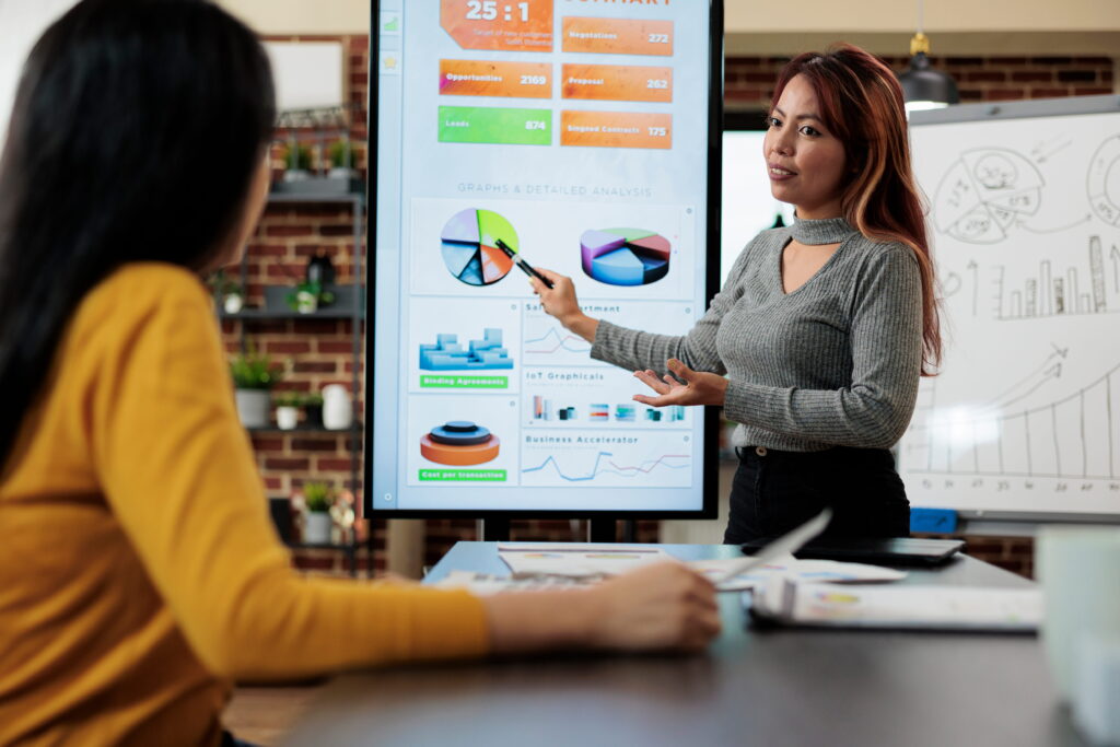 shwoing marketing graphs freelancer